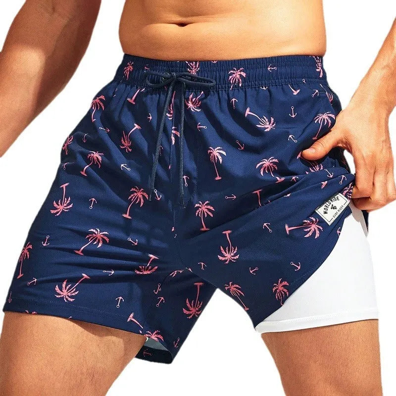Man wearing loose green boxer-style swimming trunks made from quick-drying spandex fabric.