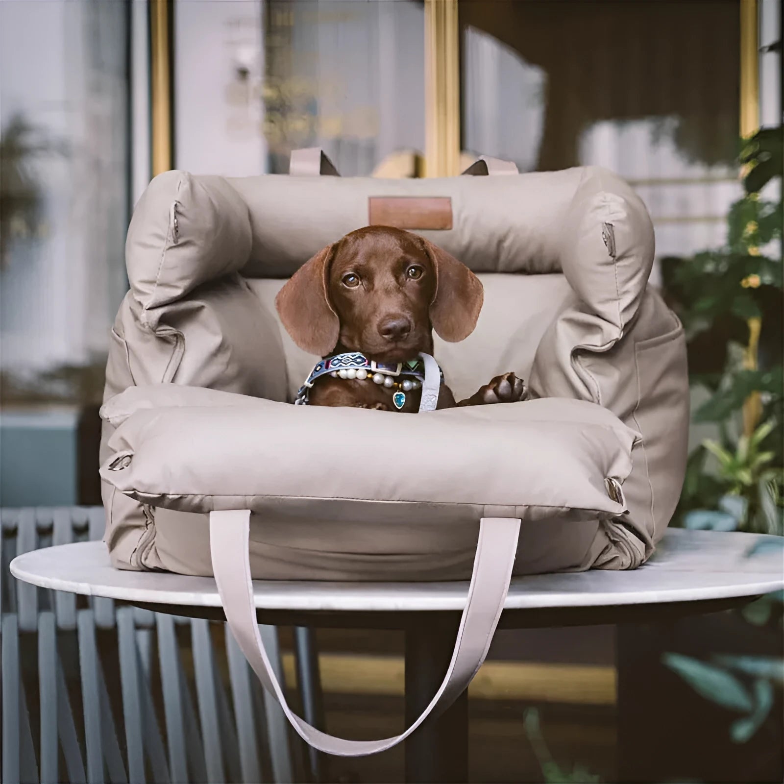 Green removable washable dog car nest with waterproof PU base, shown in a car boot