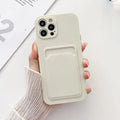 TPU card slot phone case for Apple iPhone in black with card inserted in rear slot
