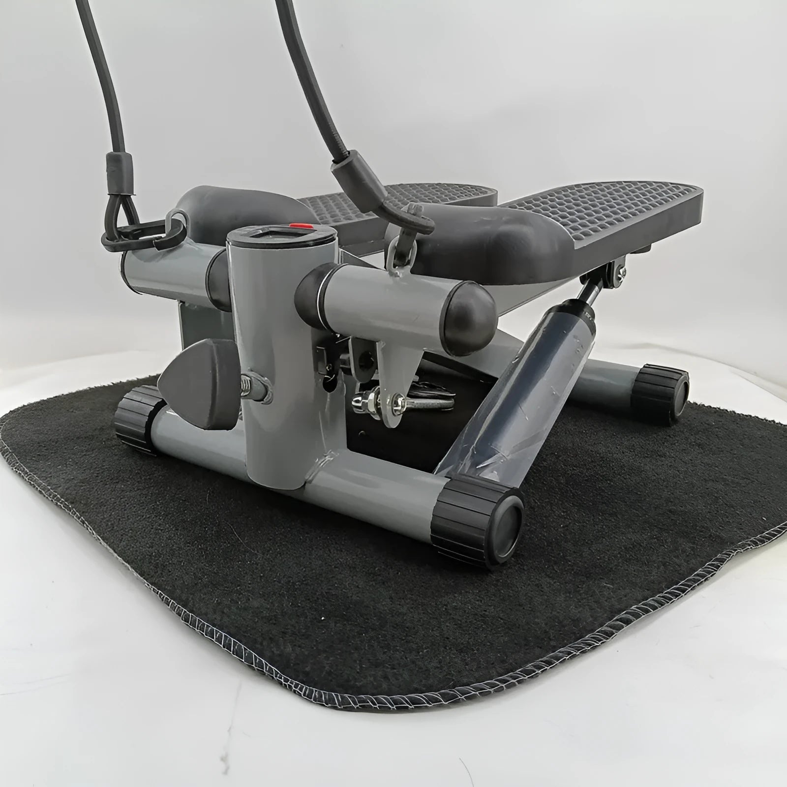 Silver grey hydraulic pedaller machine for home waist slimming and cardio exercise