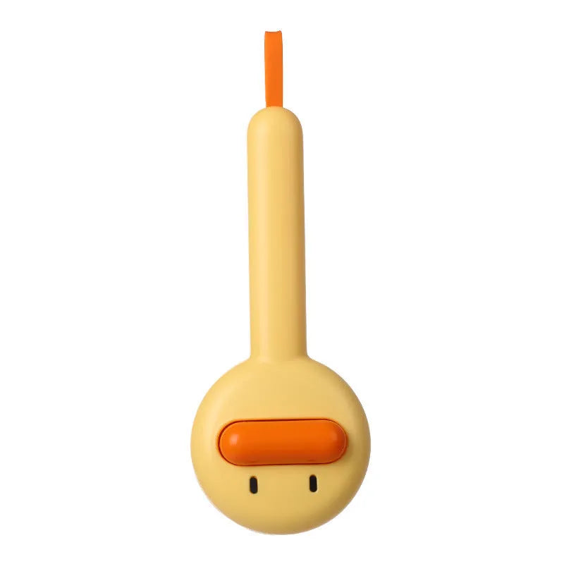 Small yellow duck-shaped pet comb with open needle design for cat and dog grooming
