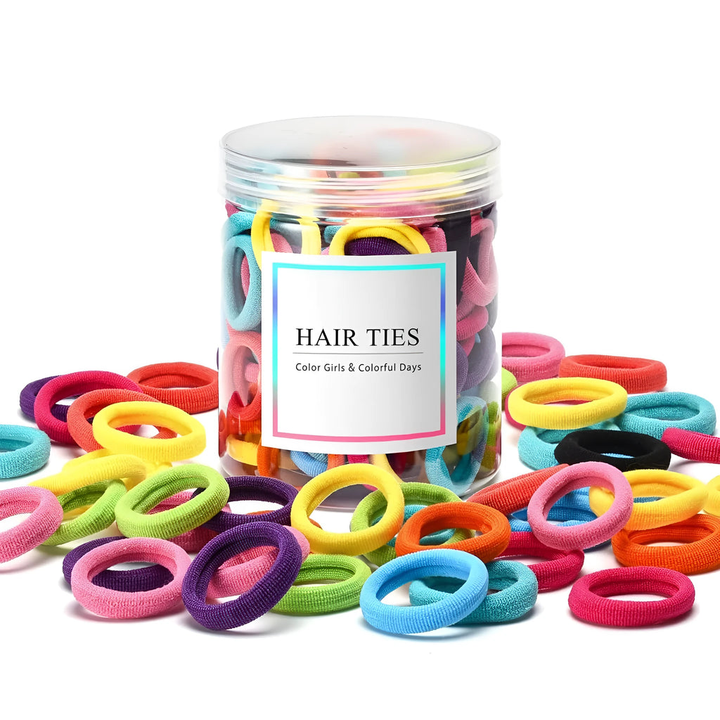 Jar of 100 multicoloured seamless cotton baby hair ties for toddlers and girls.