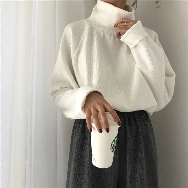 Women's solid colour half-high collar long sleeve loose fit top in white, apricot, or black