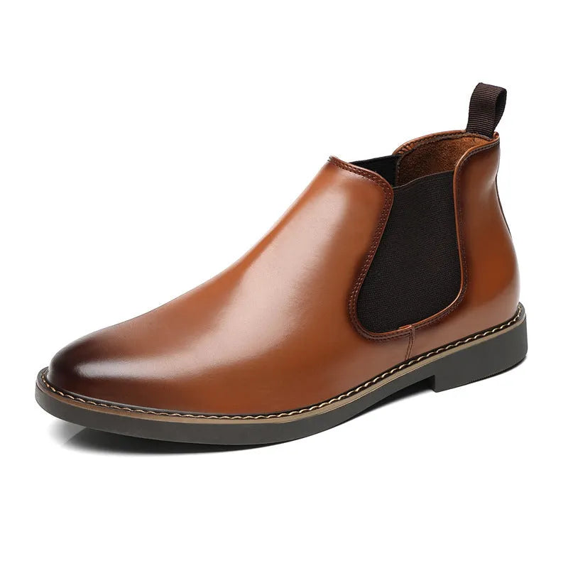 Black formal leather pointed-toe boots with a square heel and rubber sole on a white background.