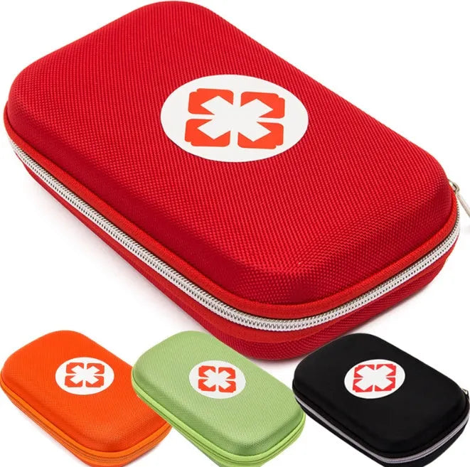 Red square plastic emergency survival medical kit box 21x13x6cm with 18 first aid pieces including scissors, bandage, plasters, and flashlight