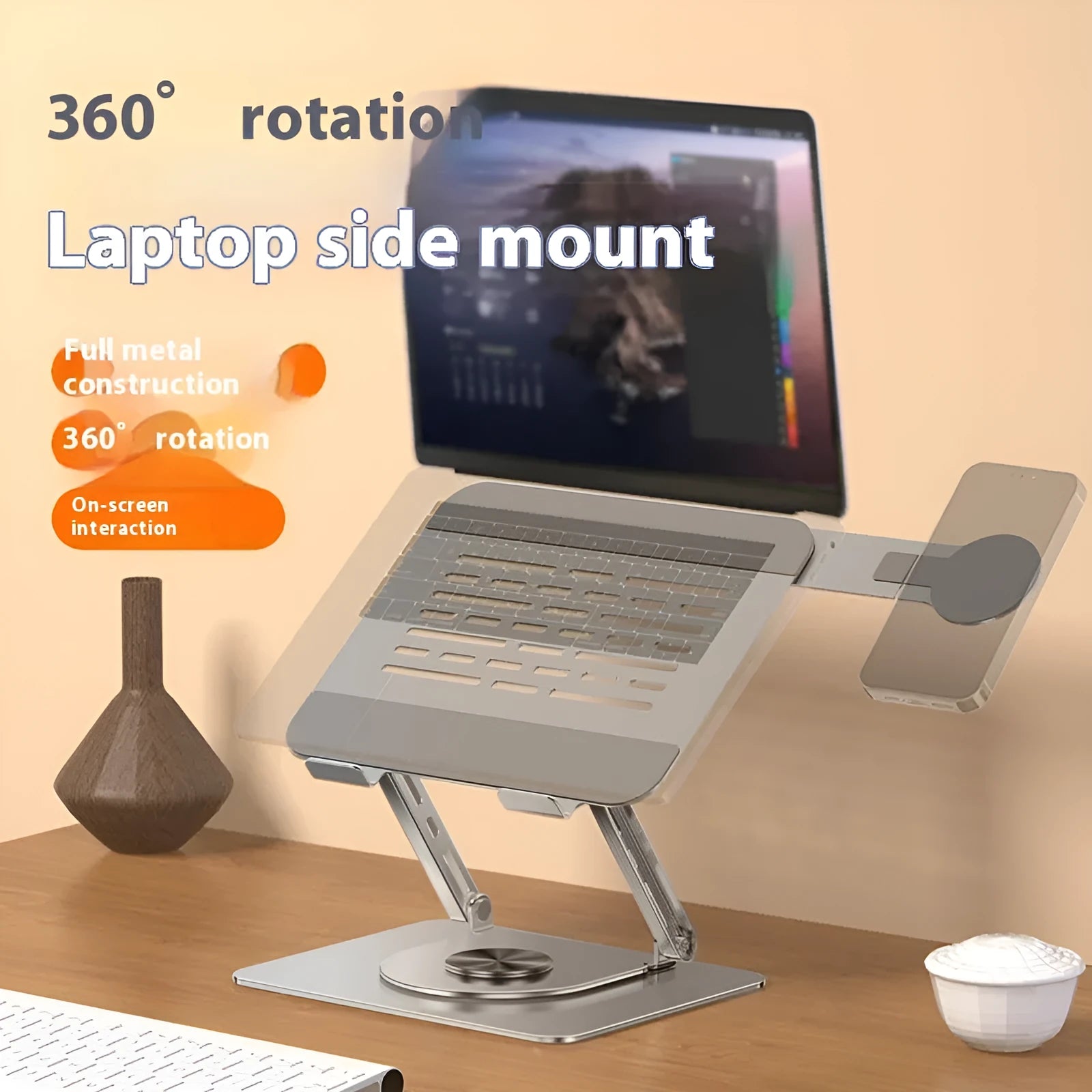 Silver carbon steel laptop stand with magnetic phone holder rotating on desk