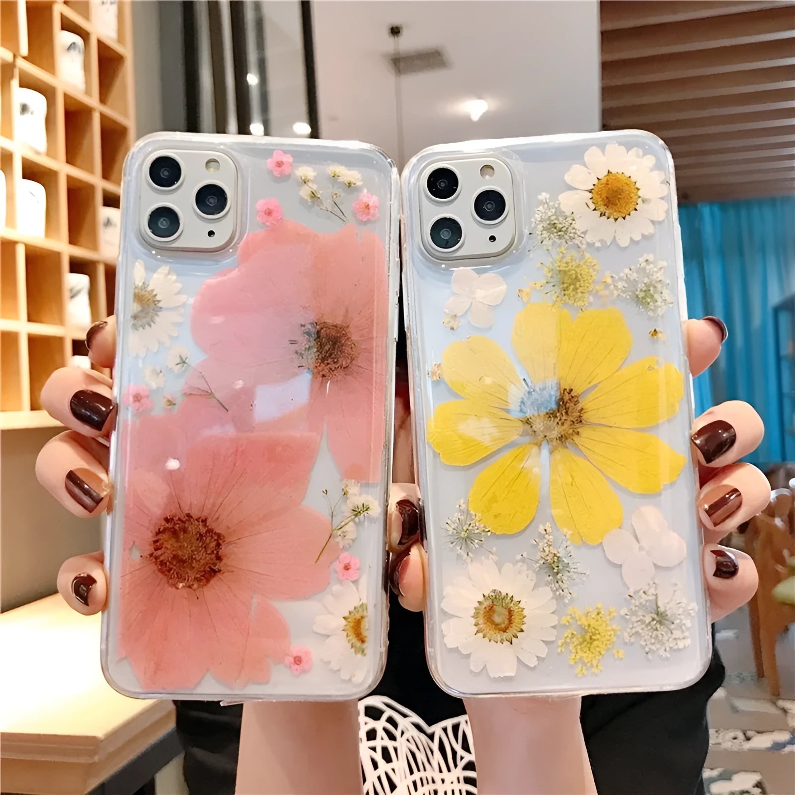 Floral iPhone case with large pink flower pattern on TPU back cover showing camera cutouts