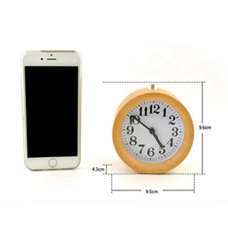 Solid beech wood alarm clock with white dial showing 4-inch diameter and wooden case