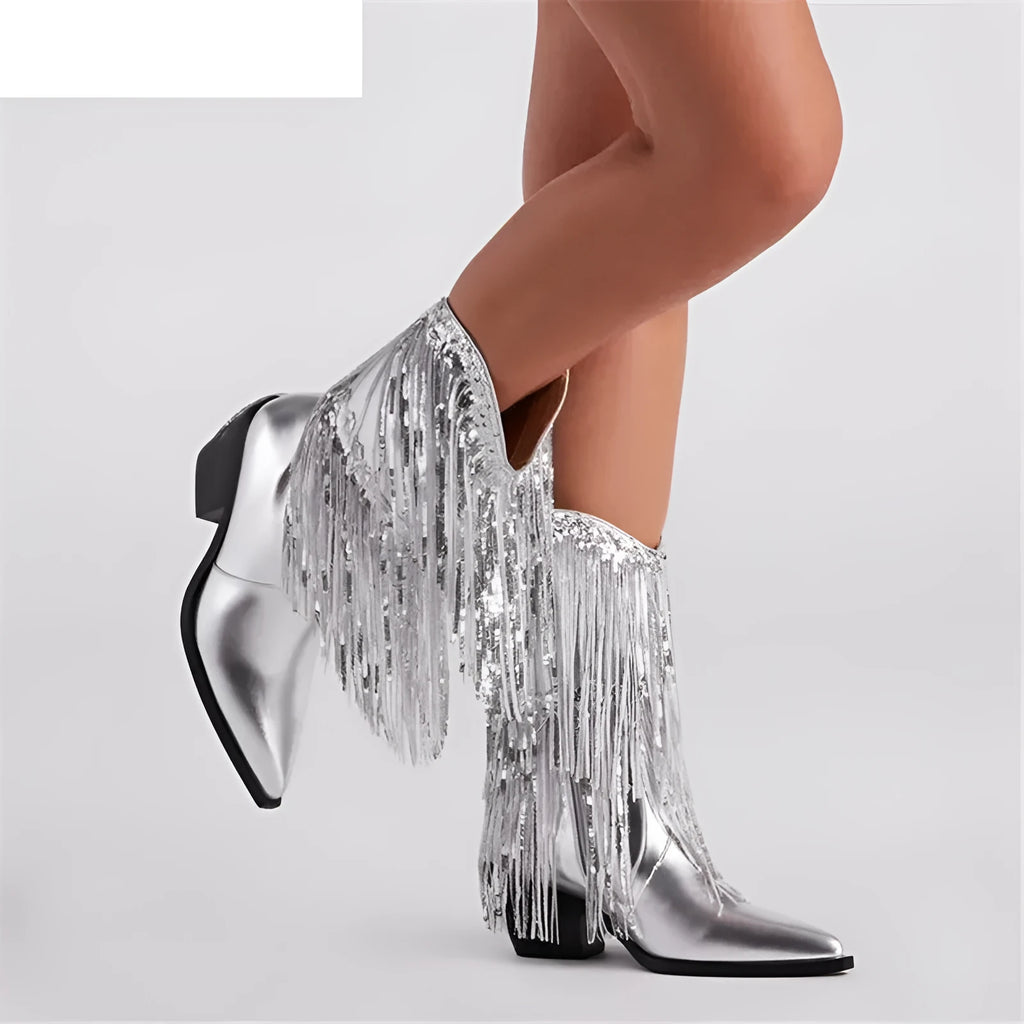 Women's black chunky heel tassel boots with a high stiletto heel and pointed toe on a white background.