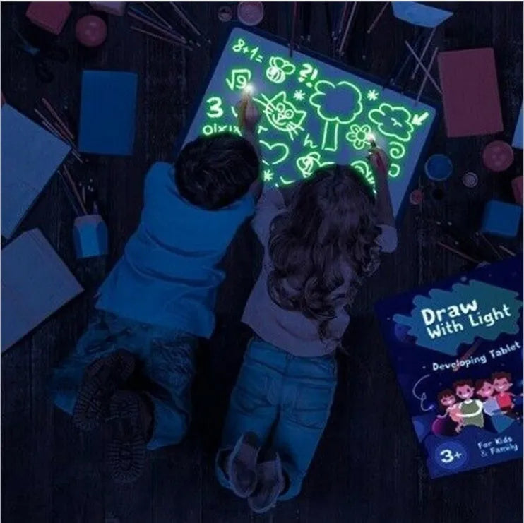 Educational drawing pad with light-accumulating coating, flashlight marker, and alphabet template for children aged 4-6.