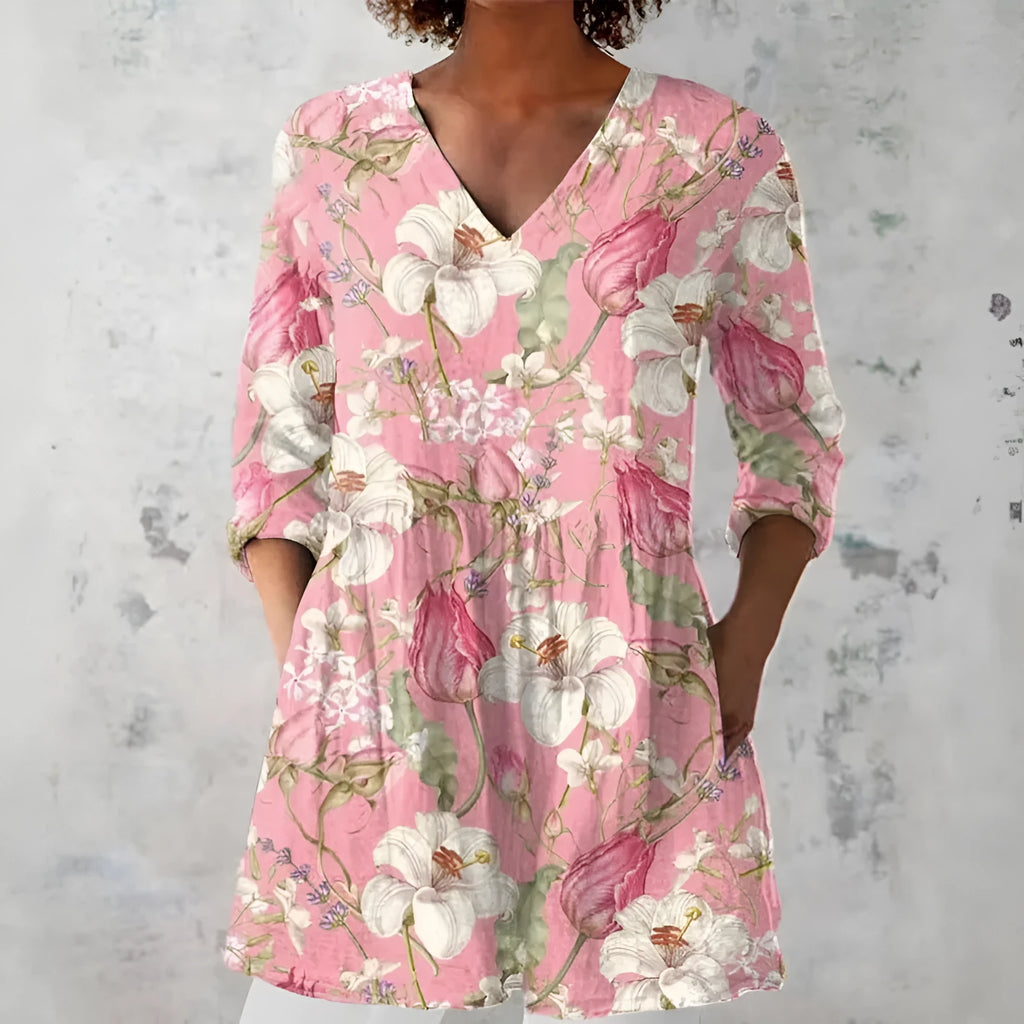 Women's retro-style slim fit long-sleeved top with a colourful digital print pattern.