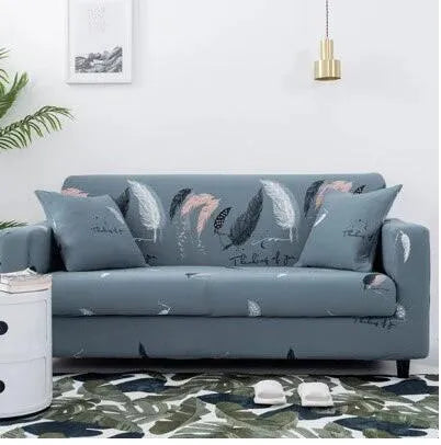Geometric patterned stretch sofa slipcover fitted on a three-seater sofa