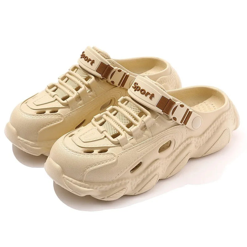Men's khaki outdoor slippers with a hollow out design and lightweight EVA sole on a wooden deck.