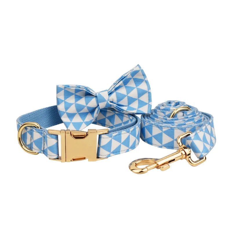 Blue cloth four-piece pet dog set showing collar, leash, bow tie and vest