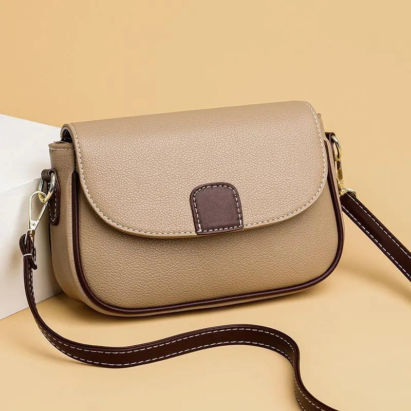 Small square PU crossbody bag with flap closure and adjustable strap in khaki, black, blue, yellow