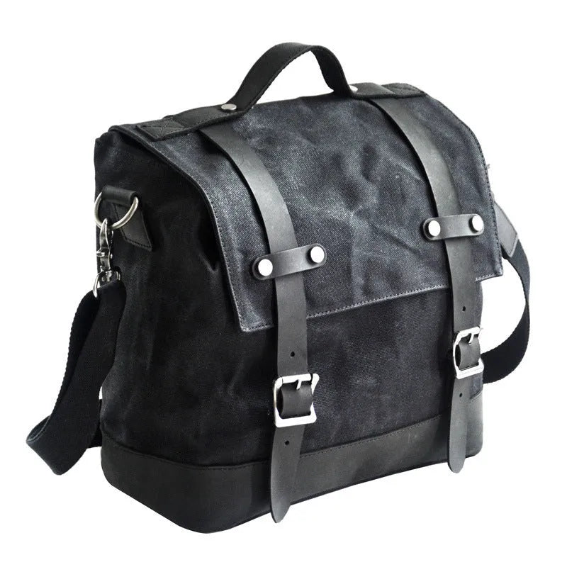 Black waterproof canvas motorcycle side bag with dimensions 300x280x150mm mounted on motorcycle
