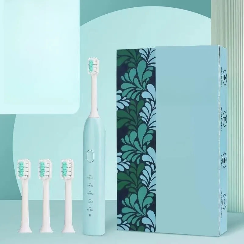 Yellow USB rechargeable adult electric toothbrush with small duck design and soft bristles.