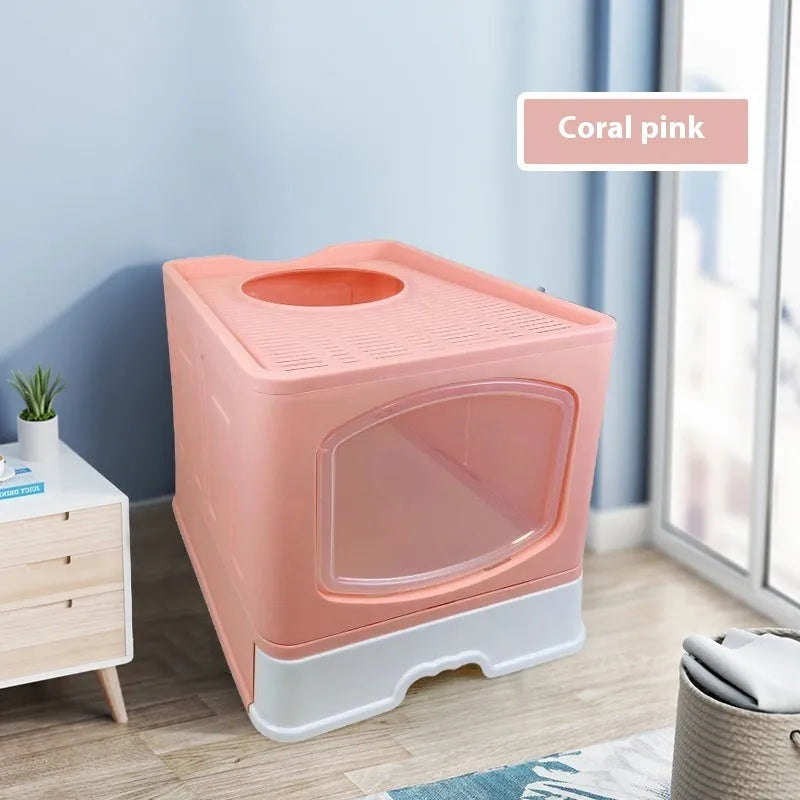 Folding enclosed cat litter box in ABS and PP, 51 x 41 x 44 cm, available in blue, pink, or grey.