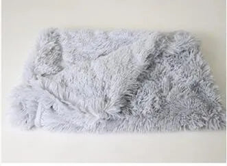 Long plush pet blanket for dogs and cats shown in light grey colour.