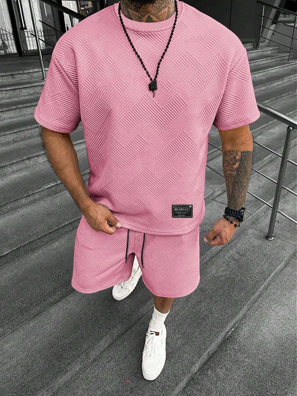 Men's short sleeve top and shorts leisure suit set in chemical fibre blend fabric