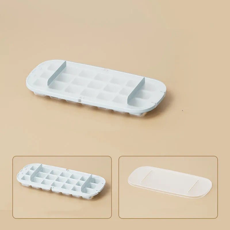 Food-grade high-capacity ice cube tray in blue with integrated storage for an ice shovel.