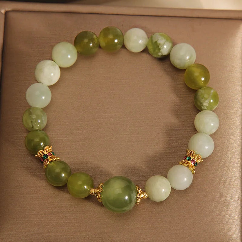 Women's original design bracelet made from green Xiuyan jade in a light luxury sweet Mori style.