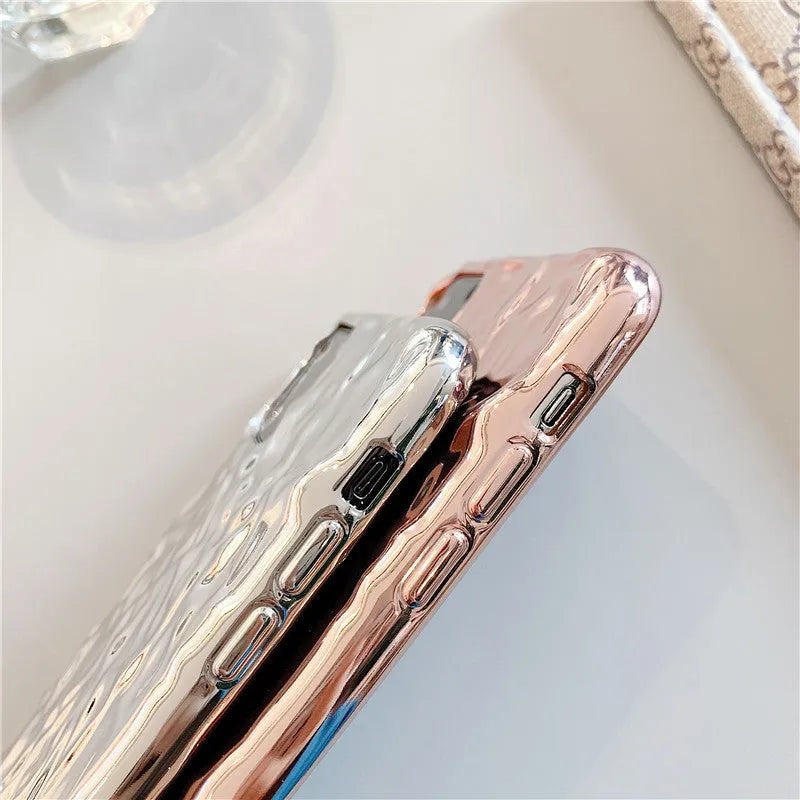 Rose Gold and Silver electroplated TPU folded back cover case for iPhone on a table