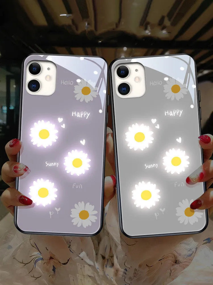White TPU iPhone case with painted purple daisies and letters, showing voice-activated colour light feature.