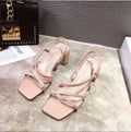 Women's apricot coloured thick wedge heel sandals with a single strap slip-on design.