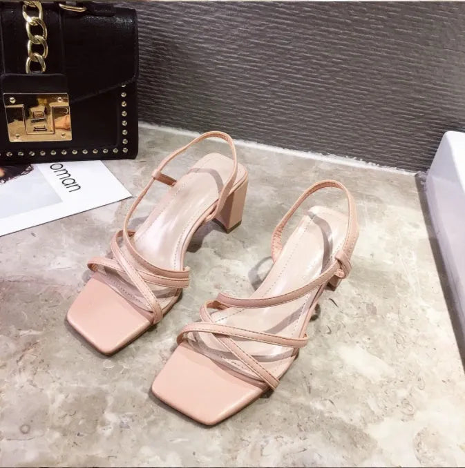 Women's apricot coloured thick wedge heel sandals with a single strap slip-on design.