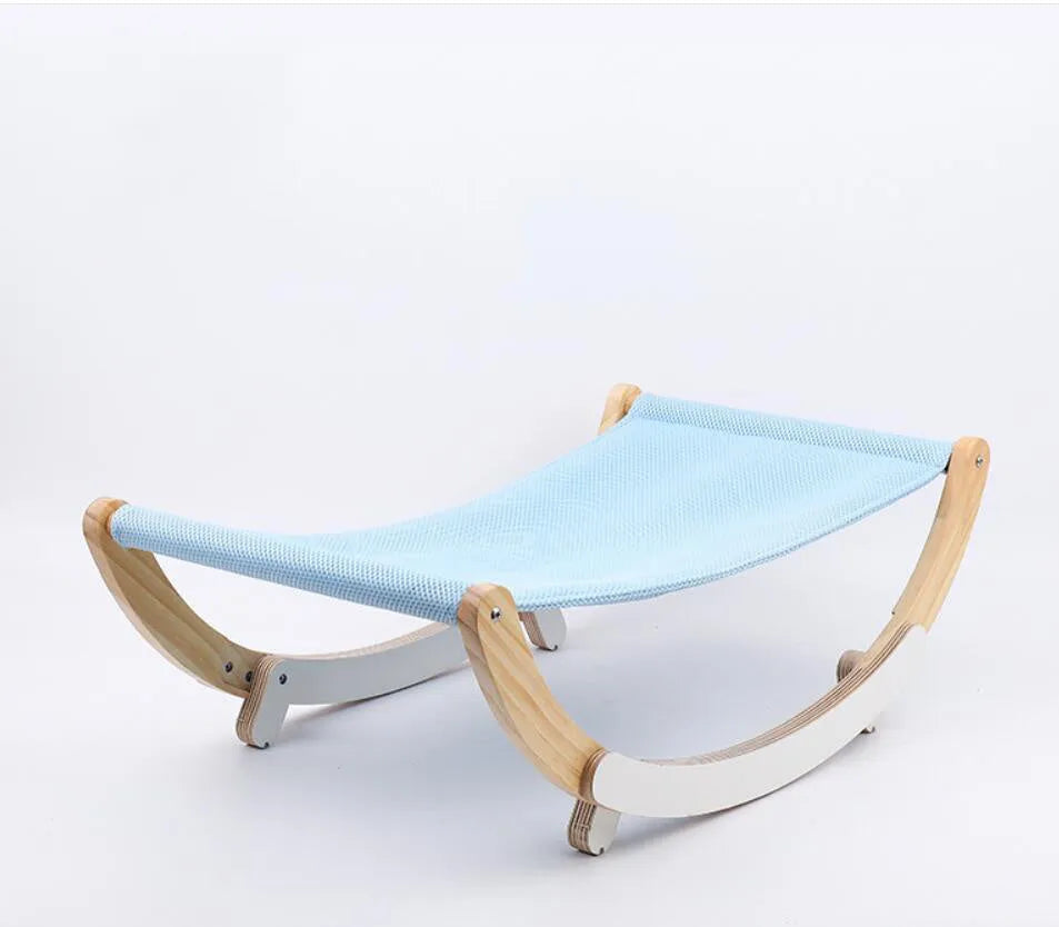 Solid wood cat shaker pet nest with off-ground design, anti-slip mat, and grey or blue cloth cushion, 56.5x30cm