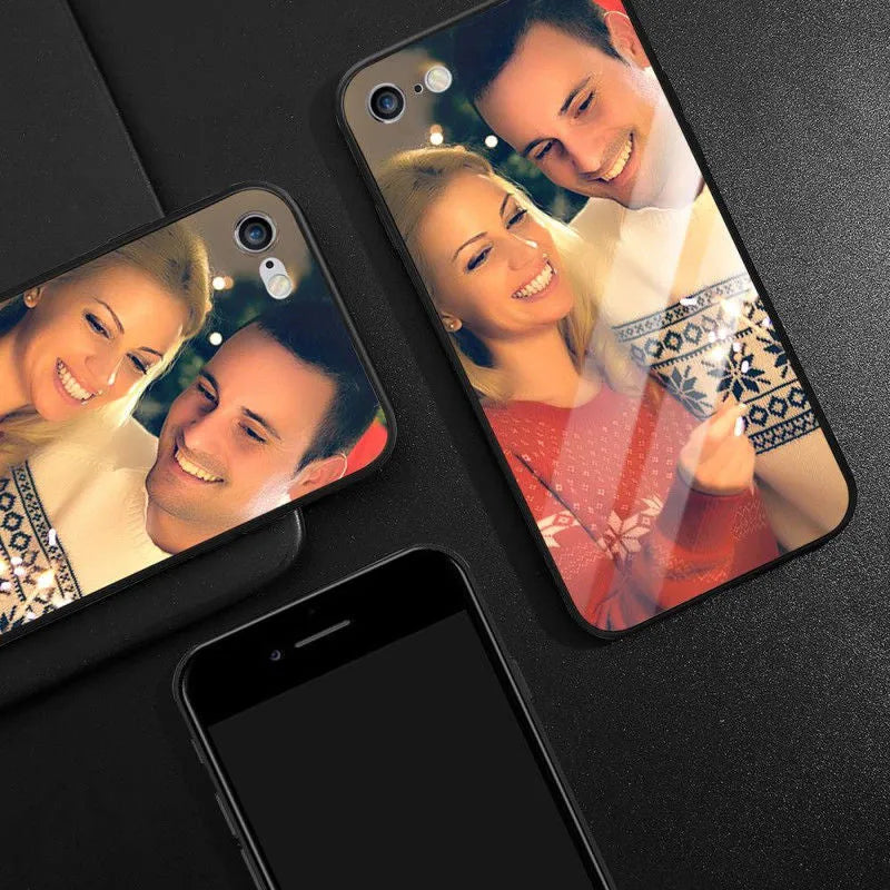 Patterned ultra-thin iPhone case with raised camera bumper edge on a table.