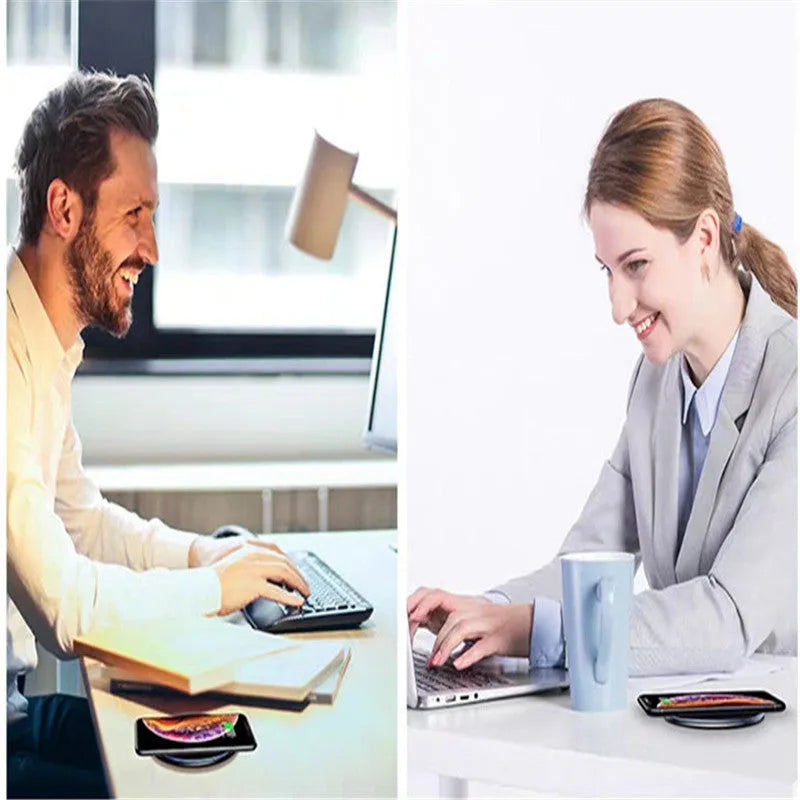 Black aluminium alloy 15W Qi fast wireless charging pad on a wooden desk