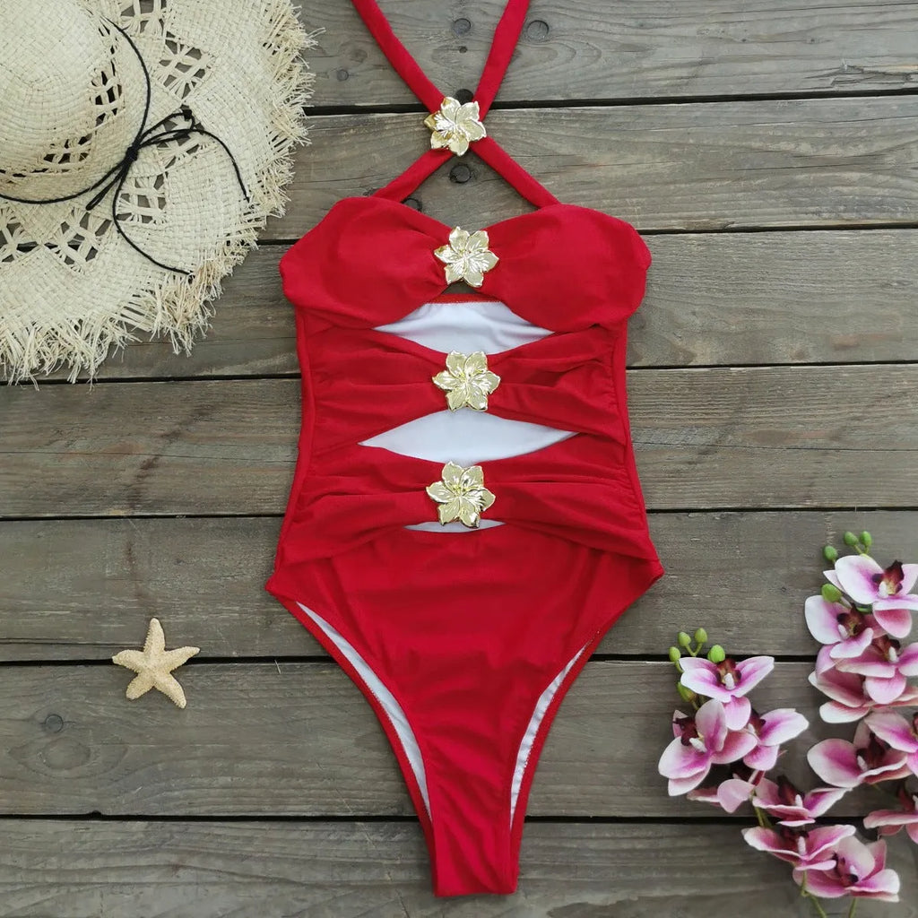 Women's solid colour one-piece swimsuit with hollow-out tube top and matching short skirt on hanger.