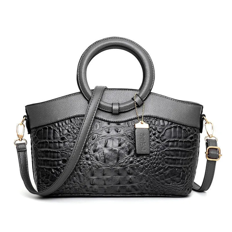 A casual fabric shoulder bag for women in multiple colours, showing zipper pockets and a handle.