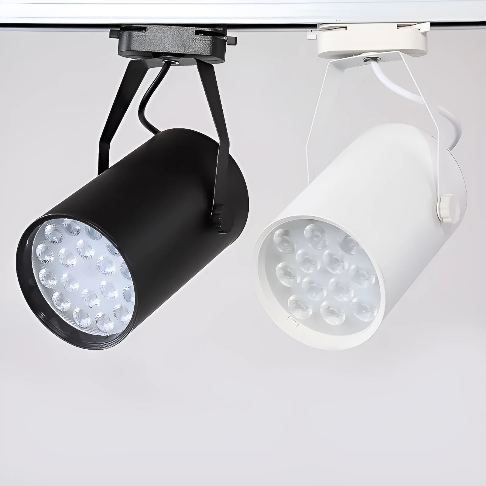 LED track spotlight with black aluminium shell mounted on lighting track