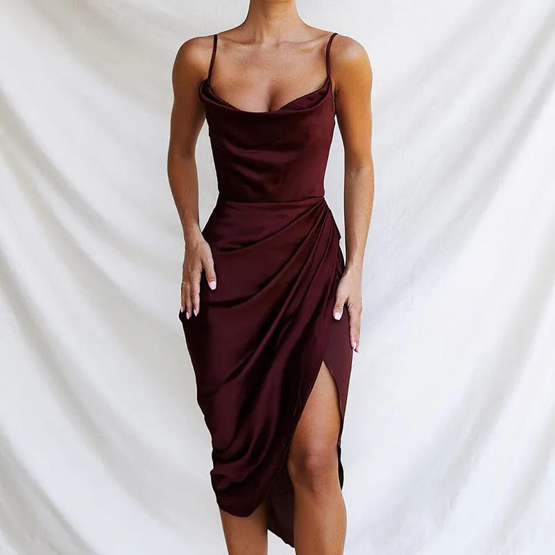 Women's black satin sleeveless skirt with high waist and front slit on a midi length
