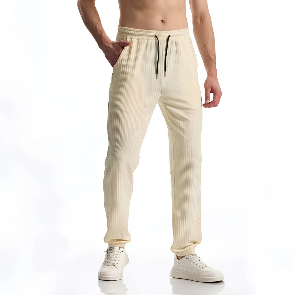 Silky rib fabric casual trousers with baggy straight-leg cut and elastic waistband