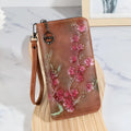 Chinese style embossed hand-painted floral pattern handbag with zipper closure in black colour
