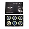 Six anti-radiation mobile phone stickers in gold and silver colours with negative ion energy