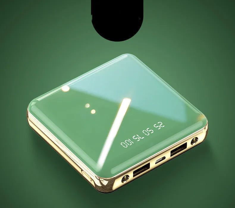 Compact blue 20000mAh mini power bank with multiple USB ports on a white background