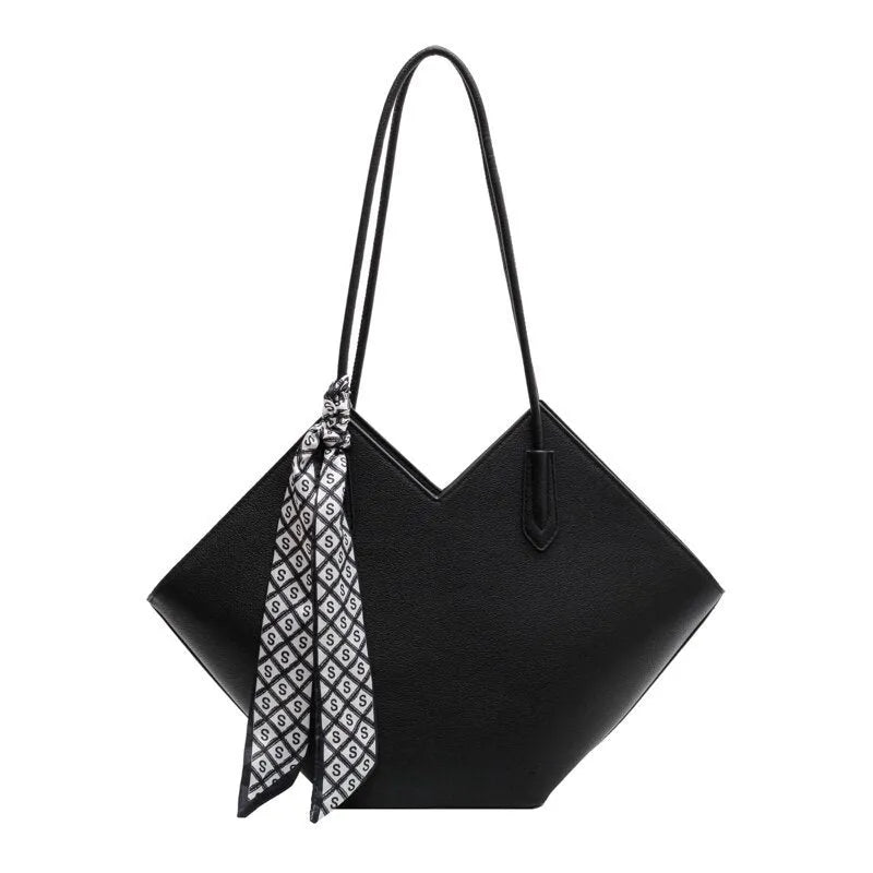 Women's large beige PU leather shoulder bag with top handle showing structured horizontal square shape.