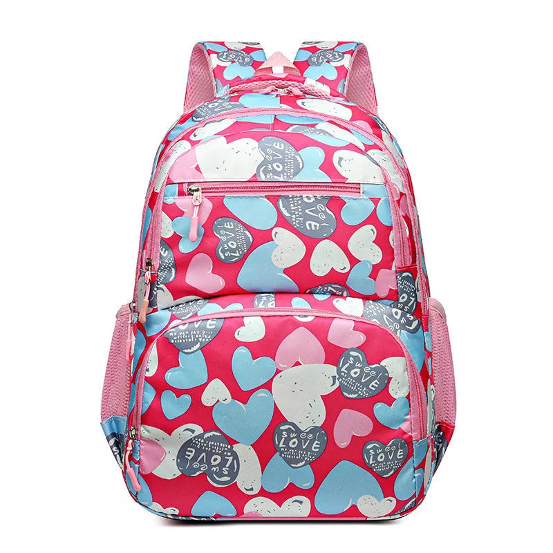 Blue student schoolbag with air pillow belt straps and large main compartment.