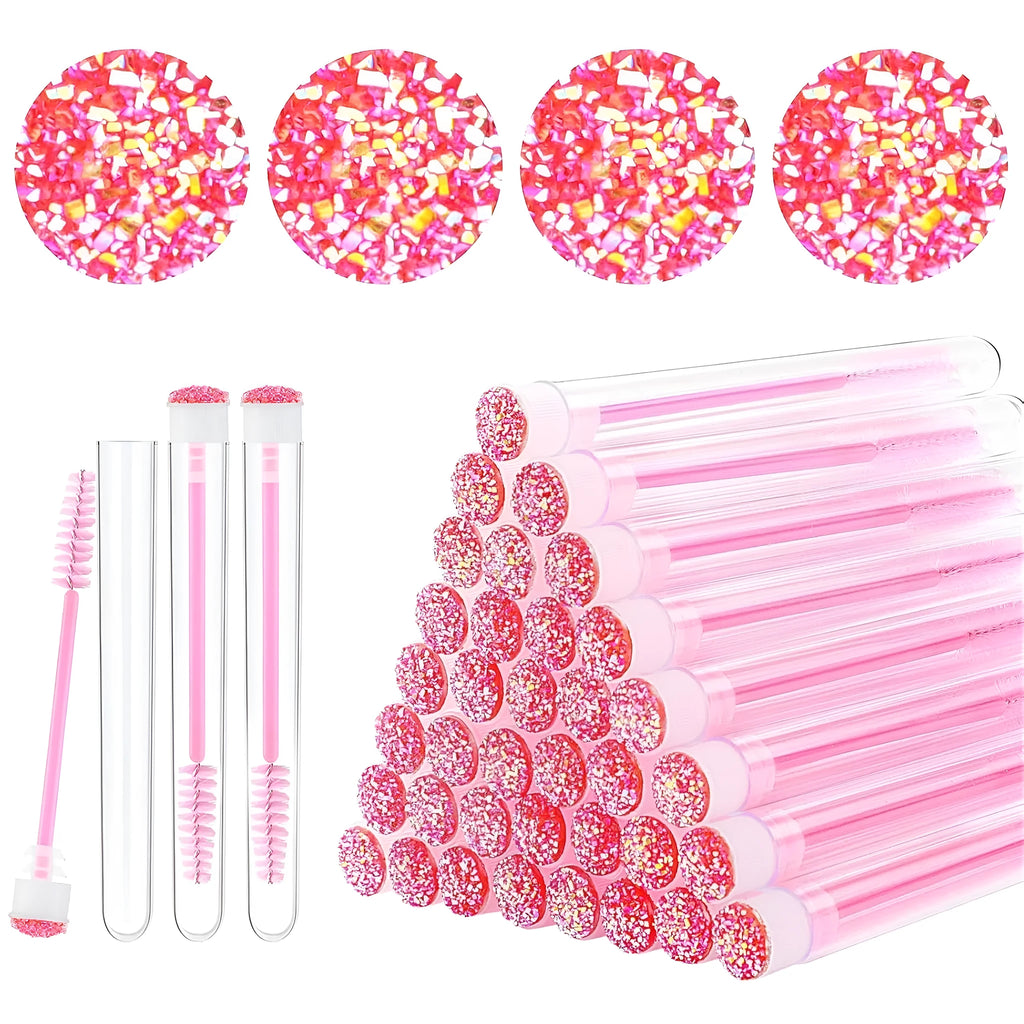 Set of coloured disposable mascara brushes inside clear plastic storage tubes on a white background.