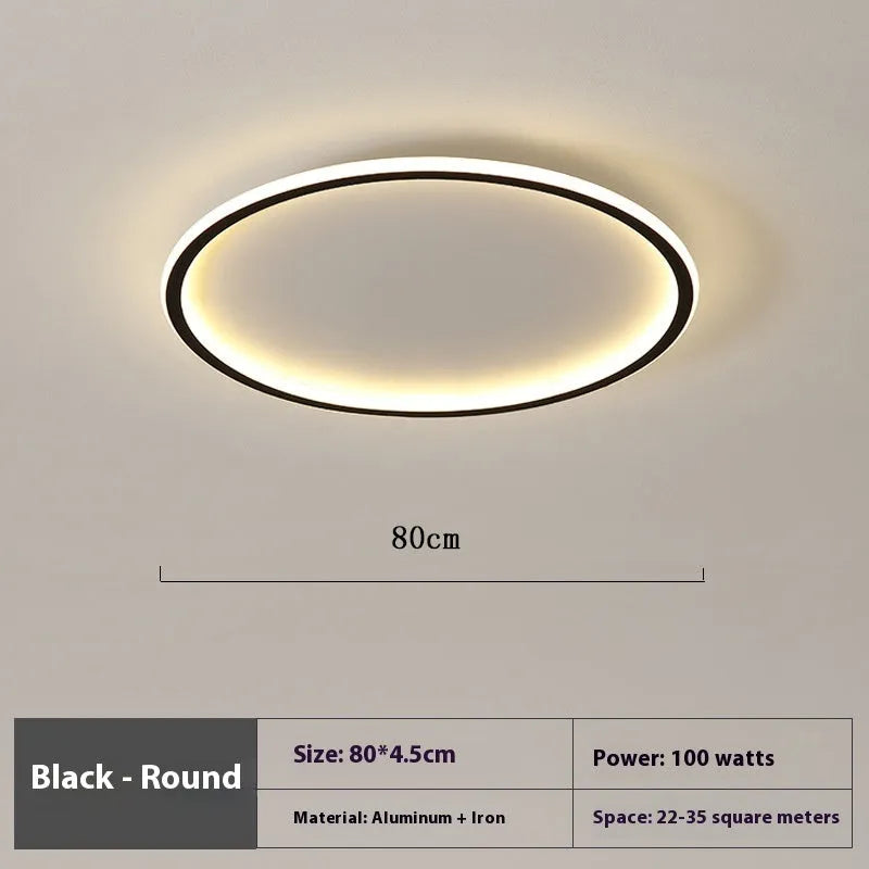 Minimalist circular dimmable LED ceiling lamp in black, gold or white finish.