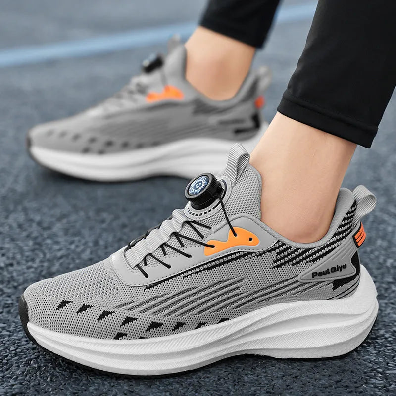 Men's white and green casual running shoes with fly-kit mesh, rotating buckle, and flat TPU sole.