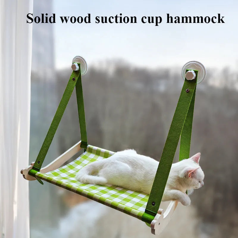 Wooden cat window hammock bed with linen fabric attached to window by suction cups