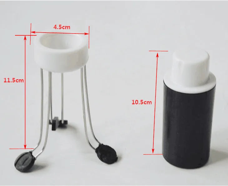 White and black automatic kitchen food stirrer with stainless steel whisk on countertop.