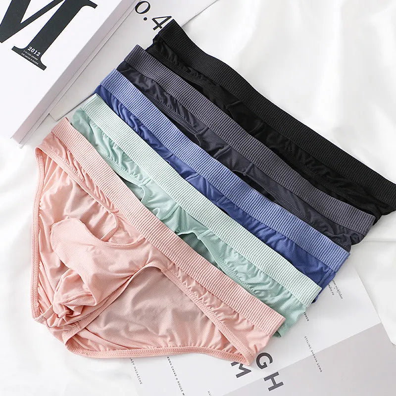 Men's black low-waist Ice Silk briefs underwear on a plain background