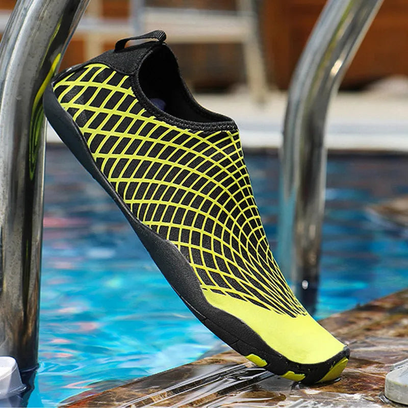 Children's snorkelling socks and river shoes with natural rubber outsole and mesh upper in black